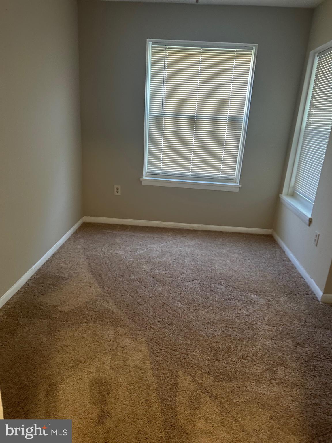 3837 St Barnabas Road, Unit 103 Suitland, MD 20746 - Photo 10 of 10 an empty room with a window
