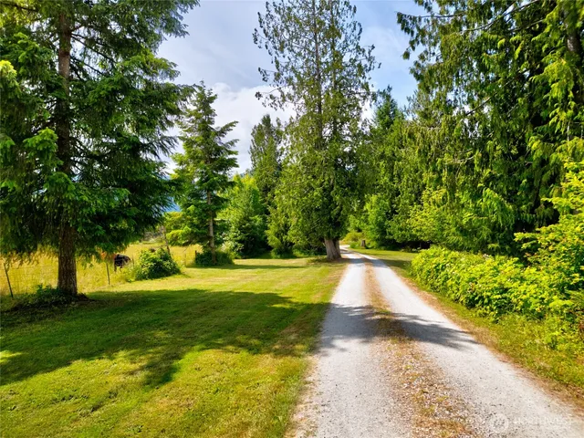 a view of swimming pool with outdoor seating