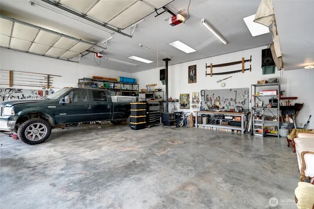 a view of parking garage with cars