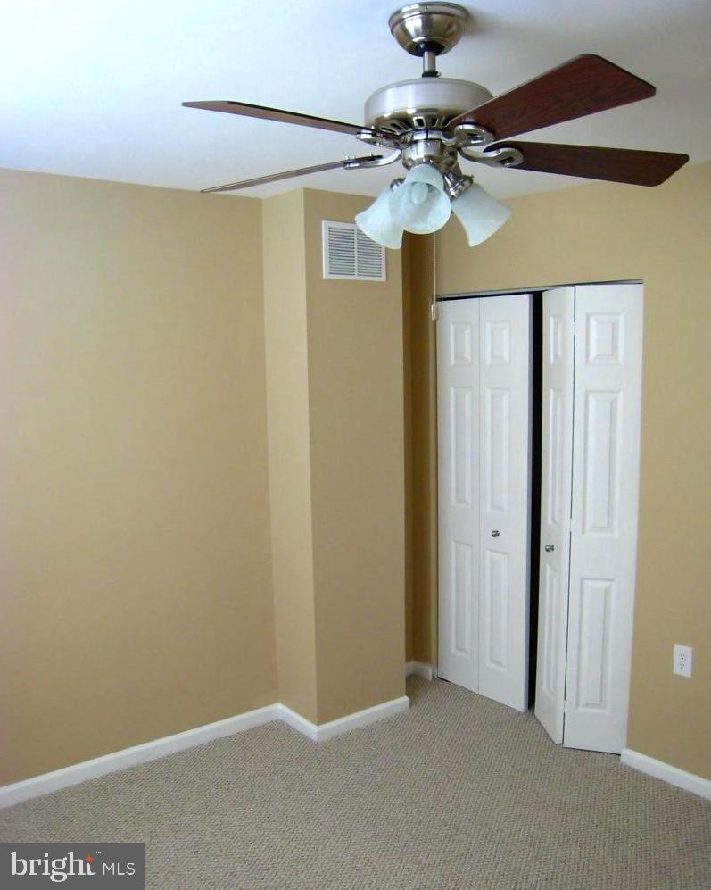 9748 Matzon Road Baltimore, MD 21220 - Photo 12 of 17 Lower level closets/fan