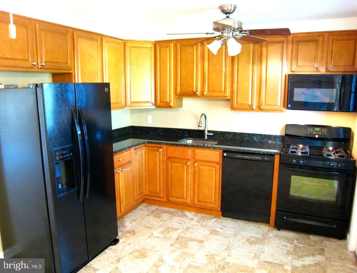 9748 Matzon Road Baltimore, MD 21220 - Photo 4 of 17 Lovely upgrded kitchen, gas stove, e-efficient apl