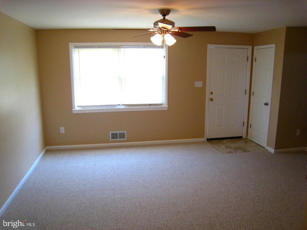 9748 Matzon Road Baltimore, MD 21220 - Photo 8 of 17 Living room - winter coat closet to the right