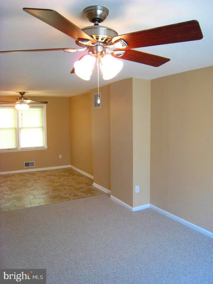 9748 Matzon Road Baltimore, MD 21220 - Photo 10 of 17 living rm ceiling fan