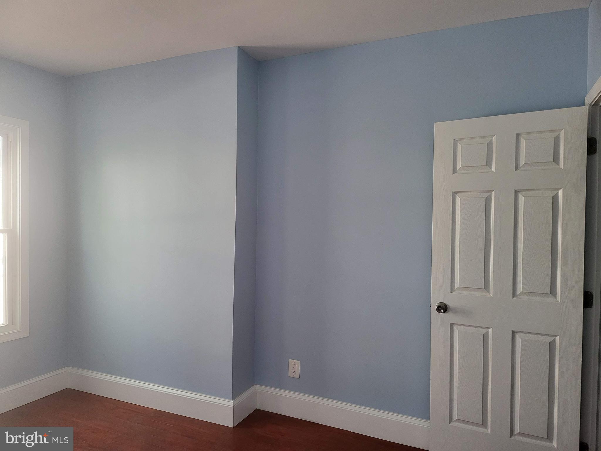 1817 Mifflin Street Philadelphia, PA 19145 - Photo 15 of 16 wooden floor in an empty room