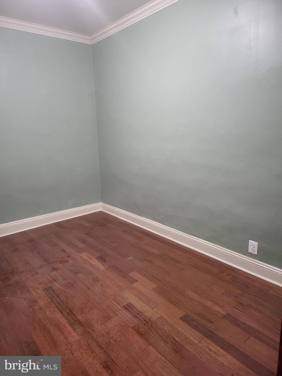 1817 Mifflin Street Philadelphia, PA 19145 - Photo 3 of 16 a view of an empty room with wooden floor