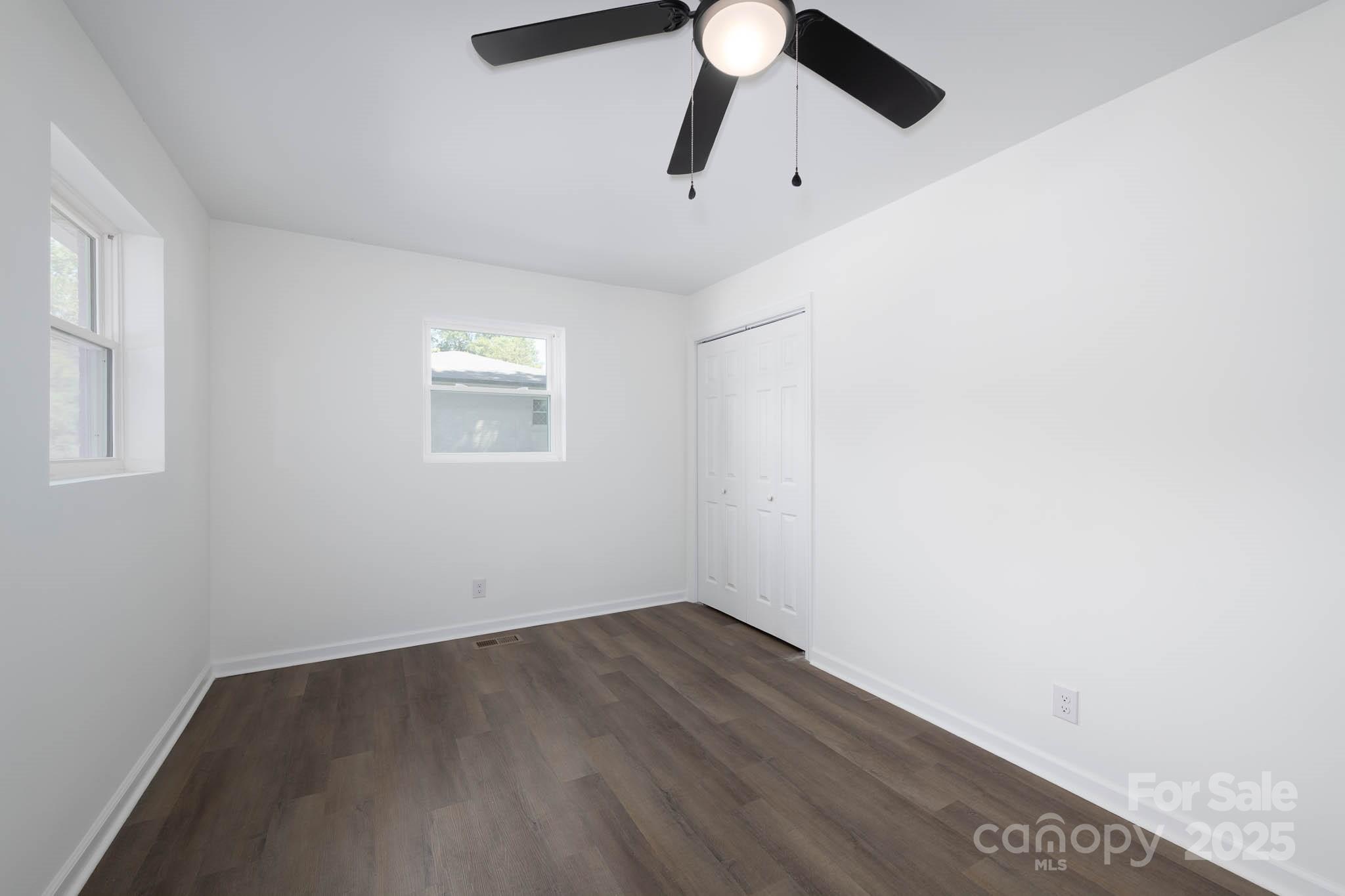 108 South Little Texas Road Kannapolis, NC 28083 - Photo 12 of 24 an empty room with a window and ceiling fan
