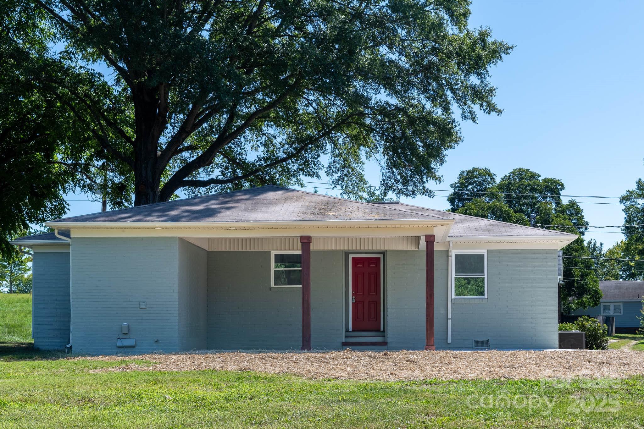 108 South Little Texas Road Kannapolis, NC 28083 - Photo 18 of 24 a view of a house with a yard