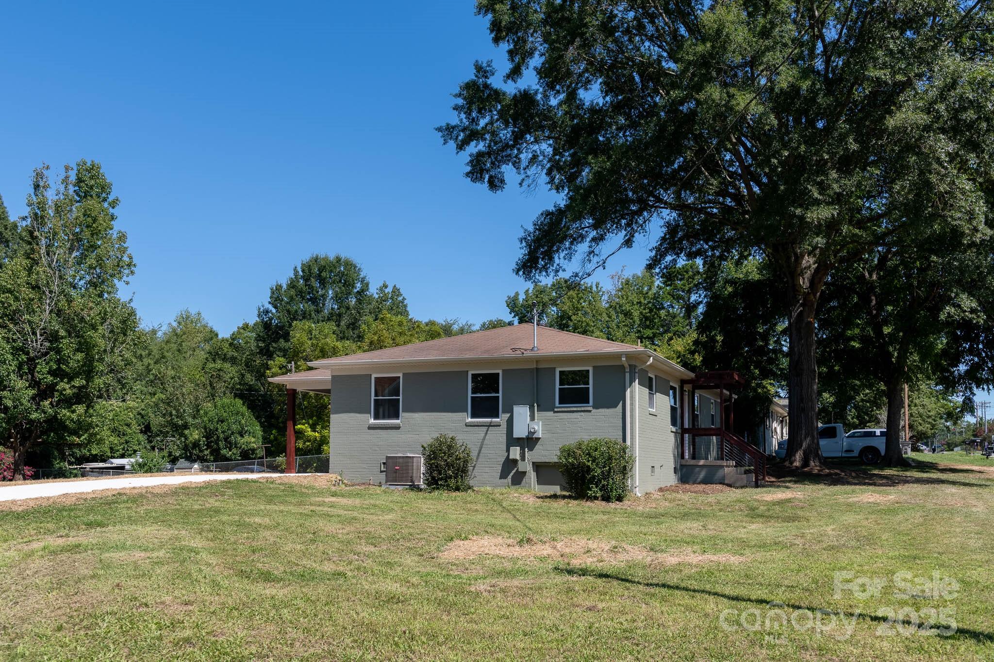 108 South Little Texas Road Kannapolis, NC 28083 - Photo 21 of 24 a view of a house with a yard