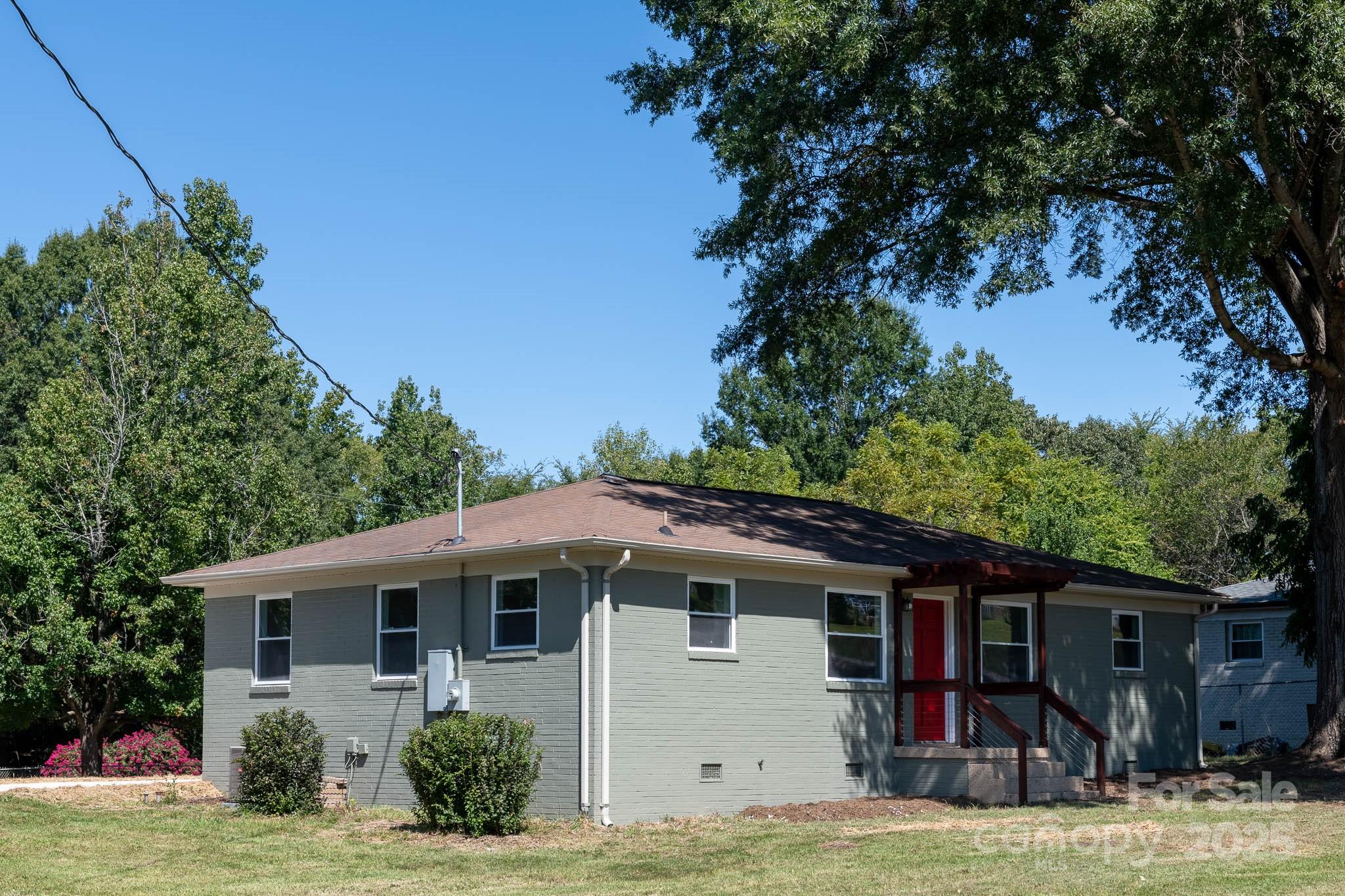 108 South Little Texas Road Kannapolis, NC 28083 - Photo 22 of 24 a front view of a house with a yard