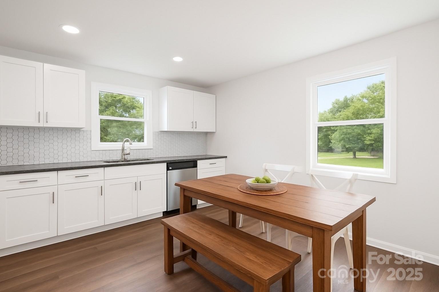 108 South Little Texas Road Kannapolis, NC 28083 - Photo 10 of 24 a kitchen with a table and chairs in it