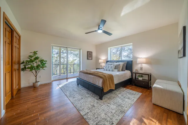 a bathroom with a sink mirror vanity and toilet