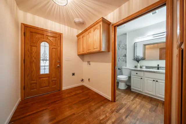 a view of a livingroom with a furniture and wooden floor