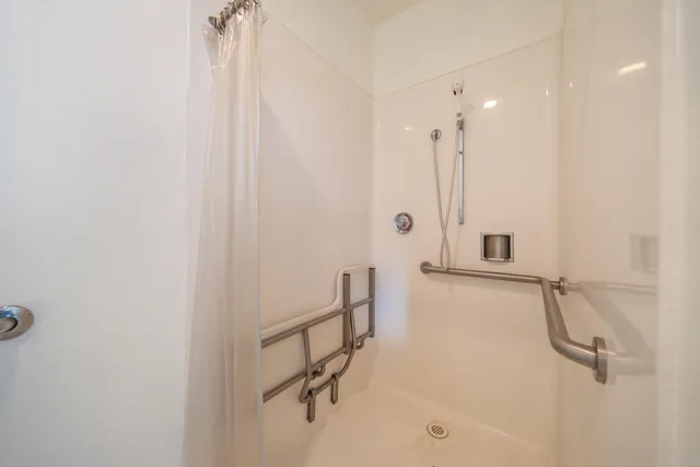 a view of balcony with wooden floor