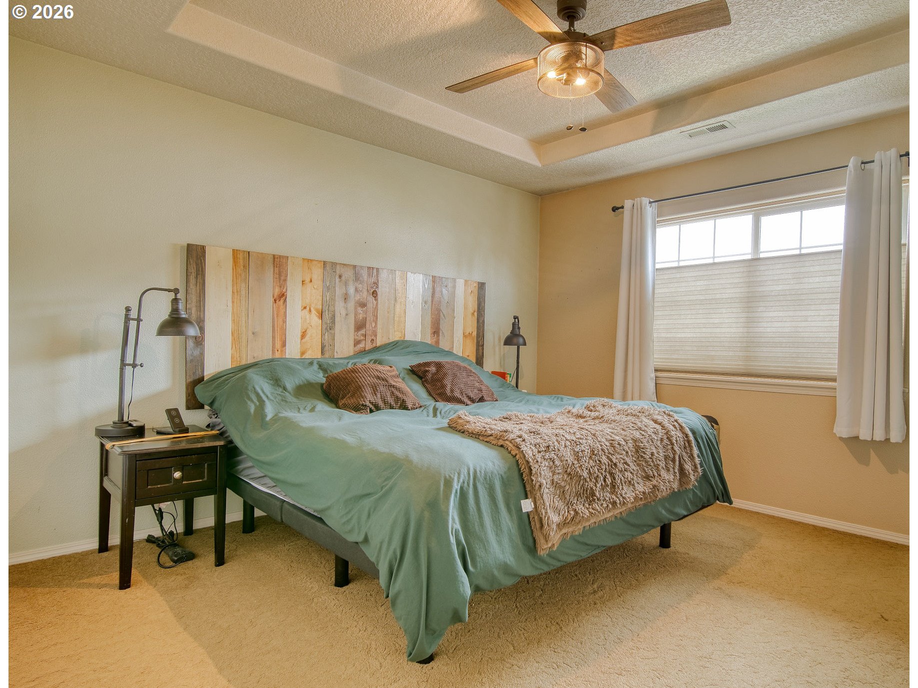 59016 Timberline Avenue St. Helens, OR 97051 - Photo 17 of 36 a bedroom with a bed and window