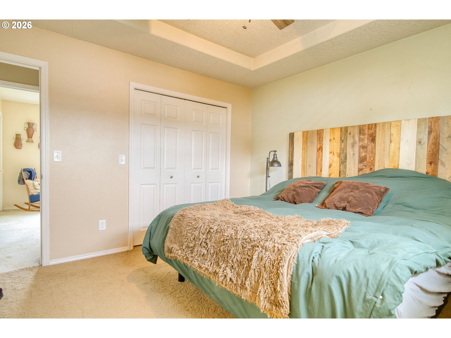 59016 Timberline Avenue St. Helens, OR 97051 - Photo 18 of 36 a bedroom with a bed and a large window