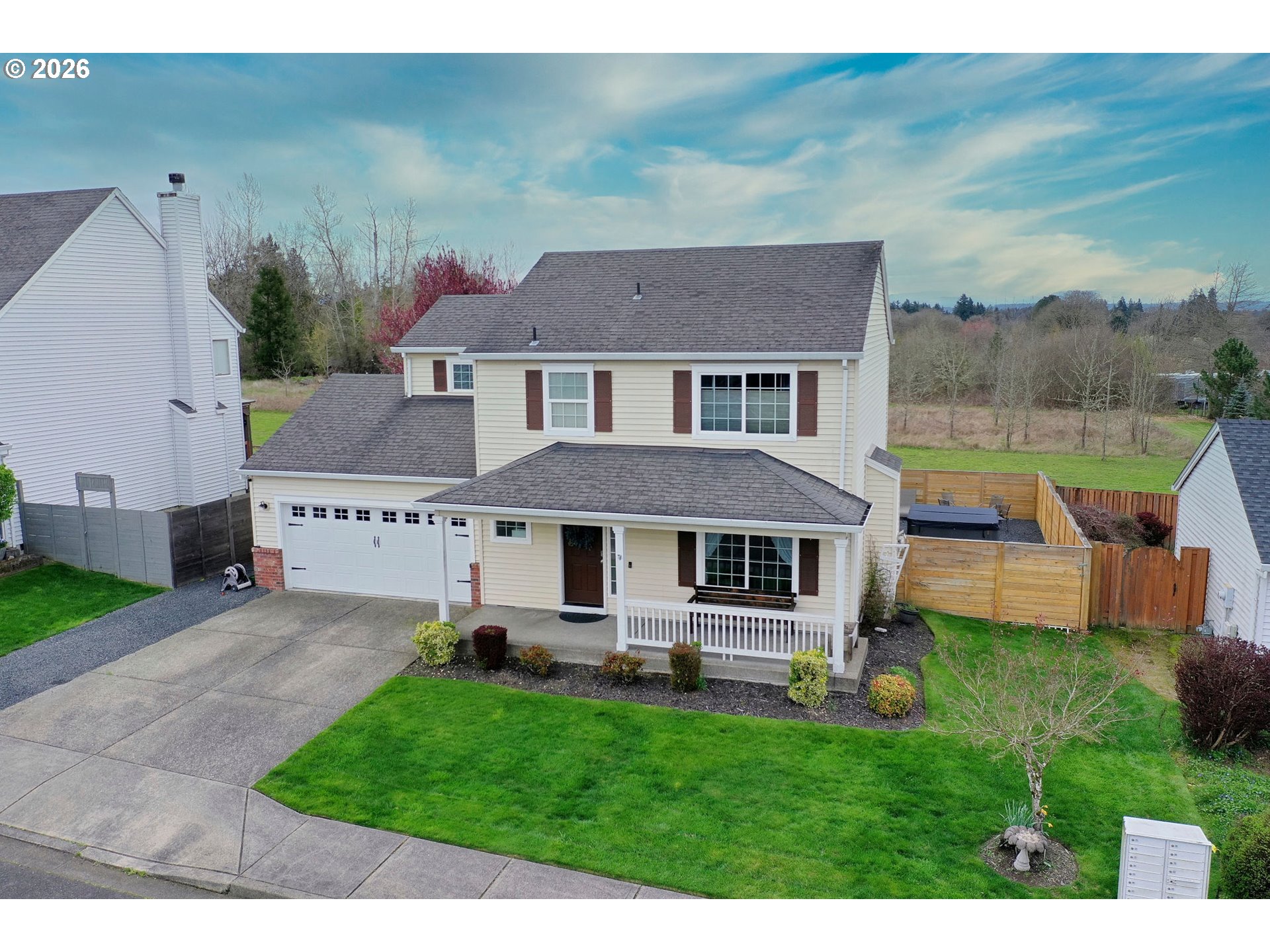 59016 Timberline Avenue St. Helens, OR 97051 - Photo 3 of 36 a aerial view of a house with a yard table and chairs