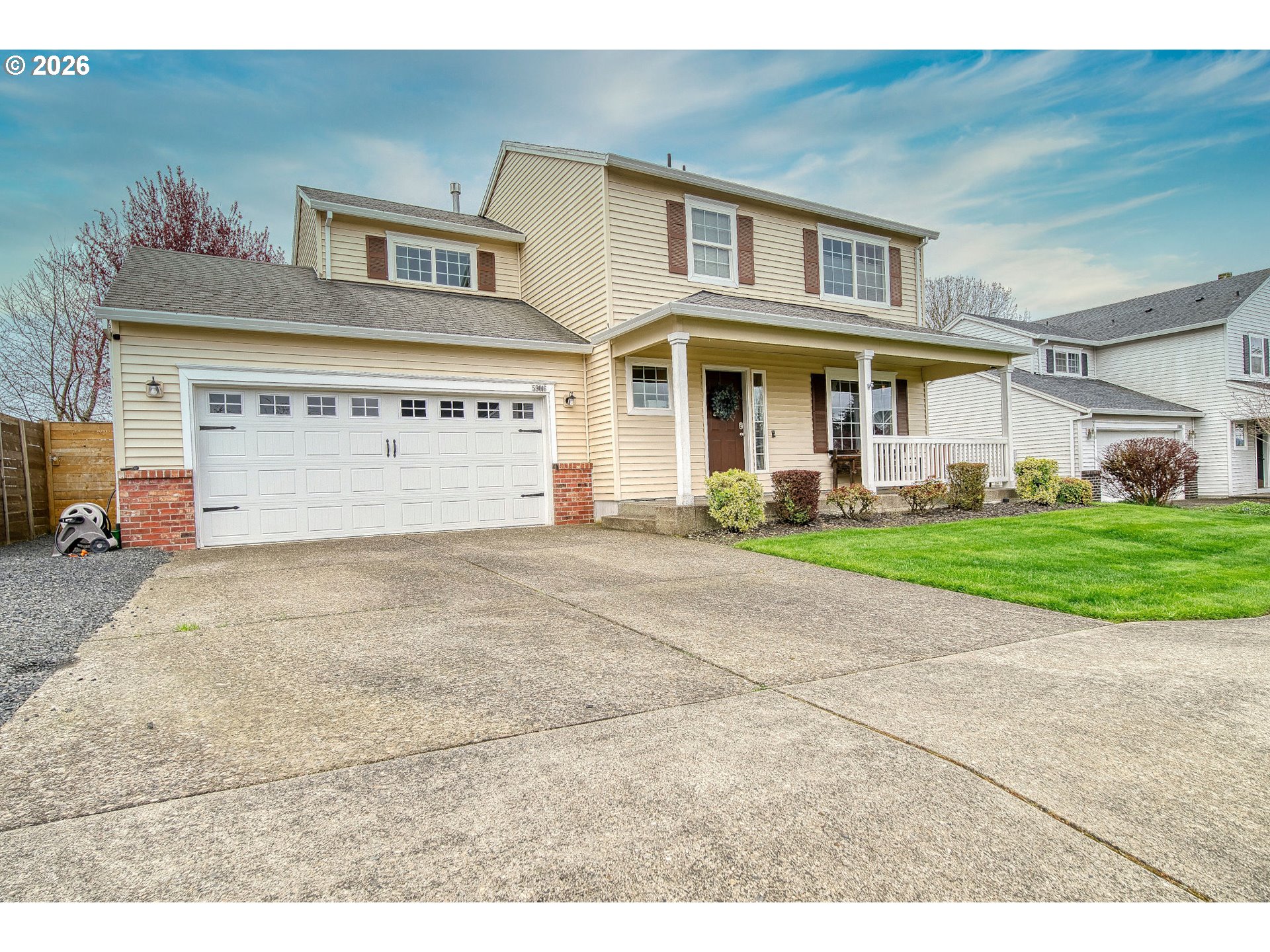 59016 Timberline Avenue St. Helens, OR 97051 - Photo 4 of 36 a front view of a house with garden