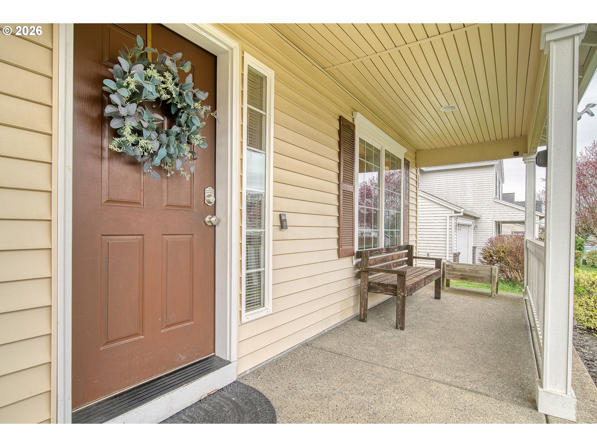59016 Timberline Avenue St. Helens, OR 97051 - Photo 6 of 36 a view of a porch with chairs and backyard of the house