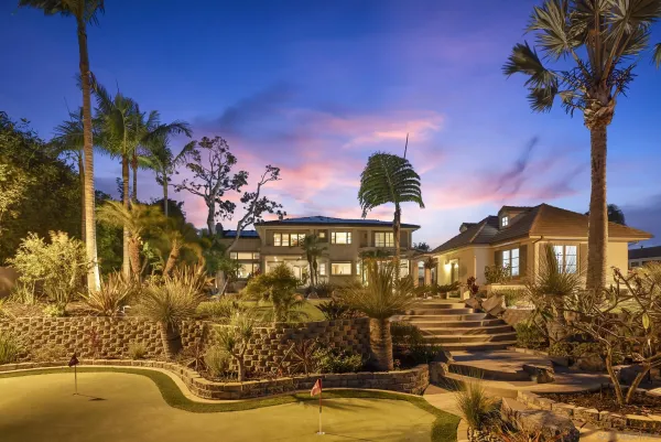 a view of a house with a swimming pool