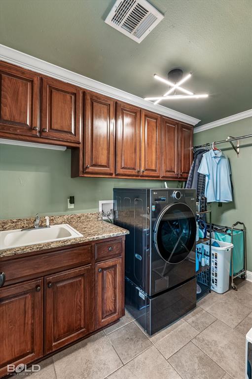 2220 Forest Hills Boulevard Haughton, LA 71037 - Photo 40 of 40 Laundry area featuring wood cabinetry, stone-finish countertops, and a utility sink