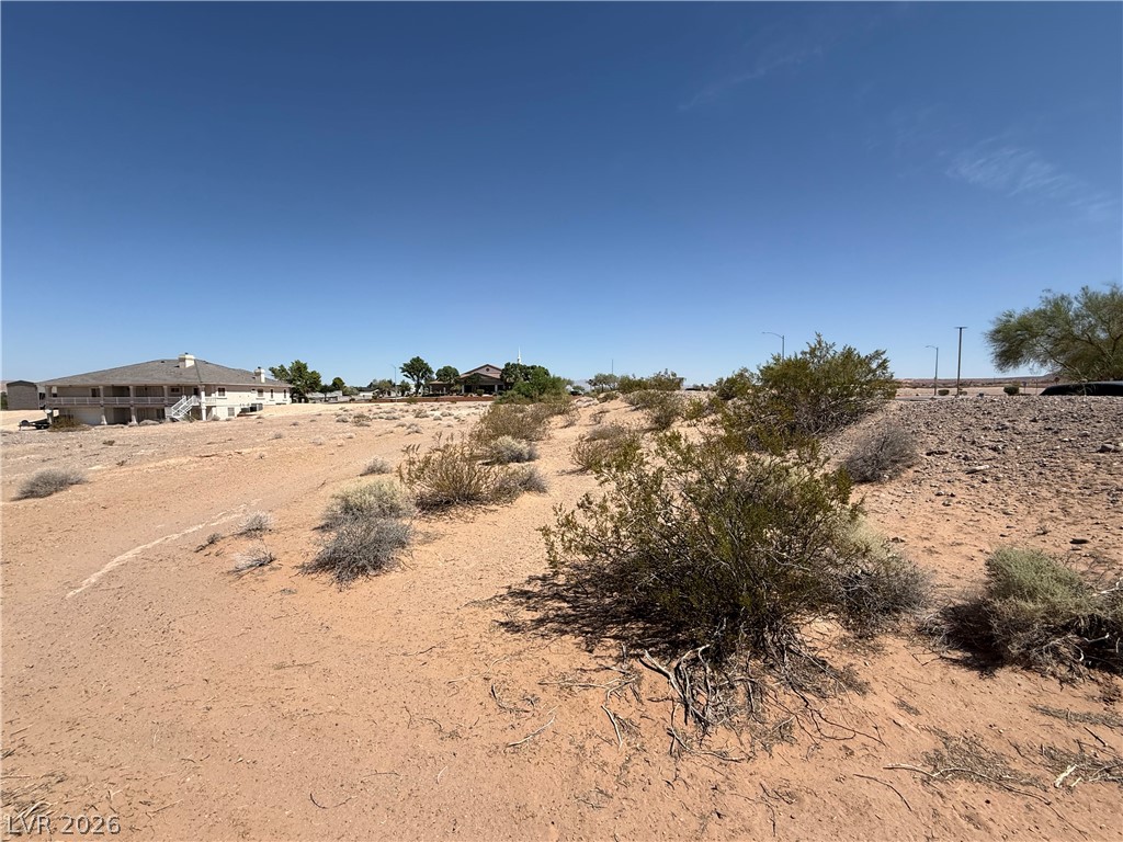 Wittwer Avenue Logandale, NV 89021 - Photo 2 of 2 A spacious desert lot awaits your vision, offering endless possibilities for custom development.