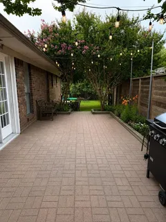 a view of a backyard with a garden