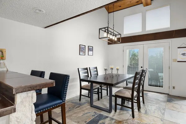 a view of a dining room with furniture