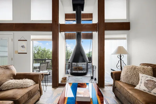 a living room with furniture and a window