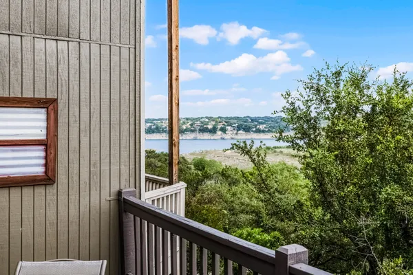a view of a balcony with an outdoor space