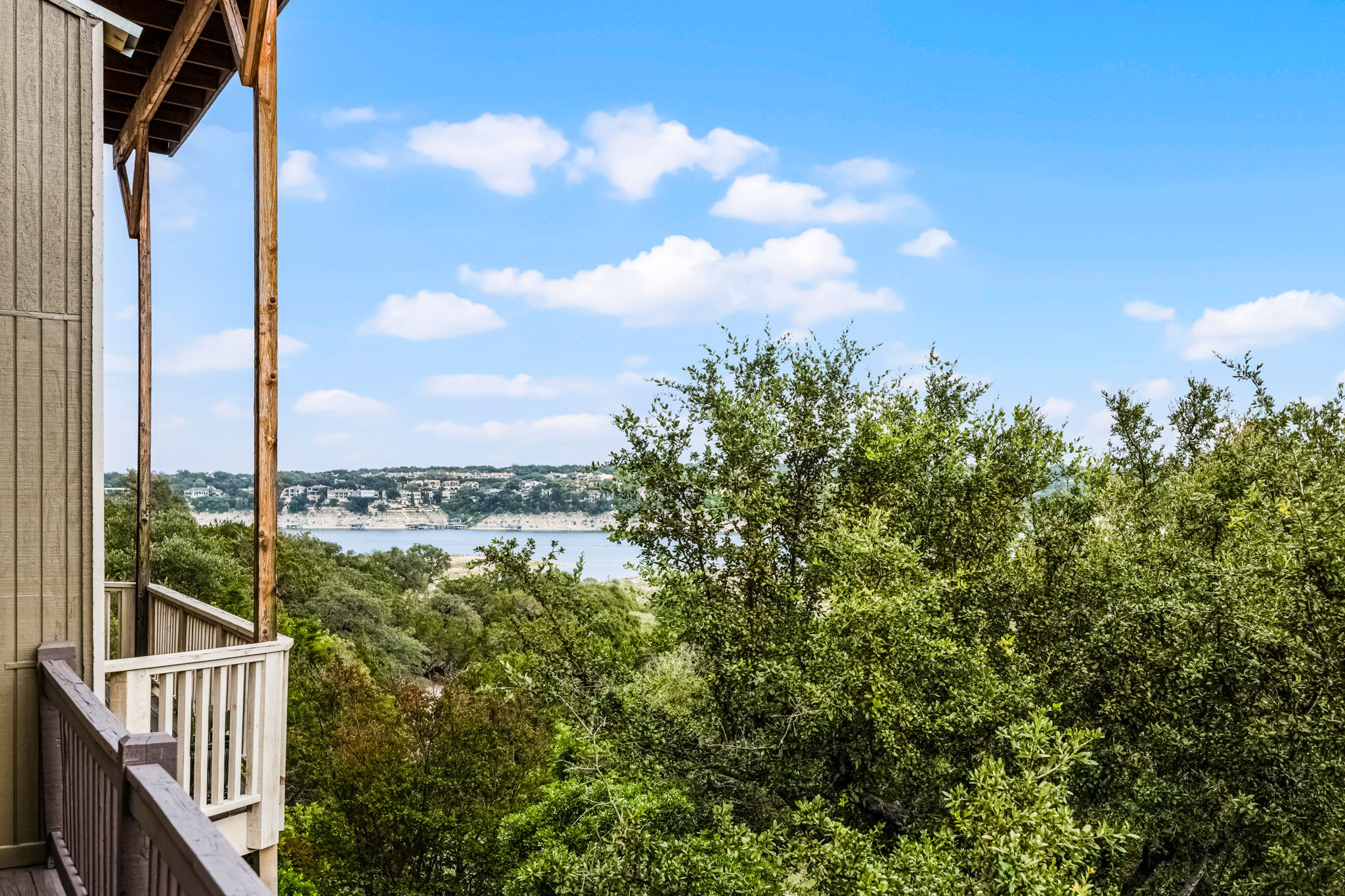 229 Comanche Lane Point Venture, TX 78645 - Photo 19 of 38 a view of a balcony next to a lake view