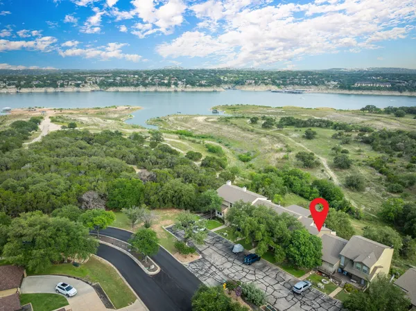 a view of lake with green space