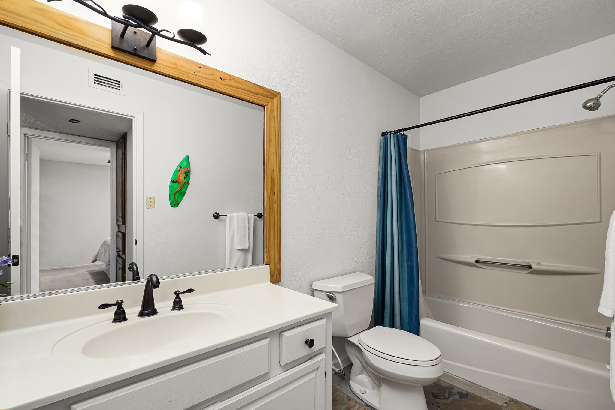 229 Comanche Lane Point Venture, TX 78645 - Photo 34 of 38 a bathroom with a sink toilet and shower