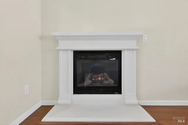 a living room with a fireplace