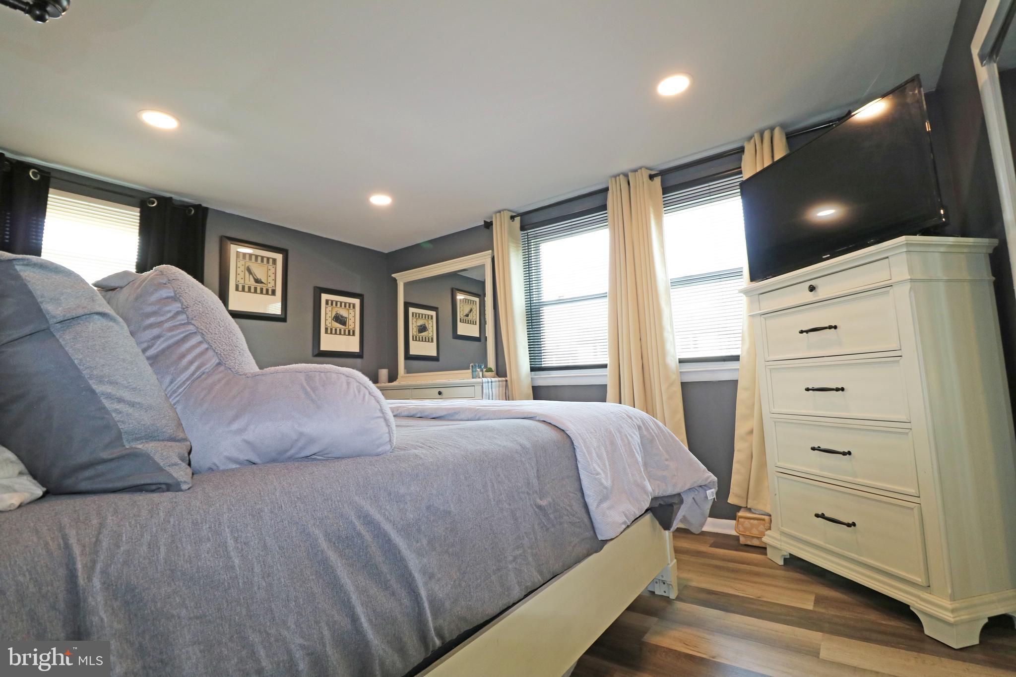 212 Riverview Avenue Ridley Park, PA 19078 - Photo 15 of 45 a bedroom with a large bed and window