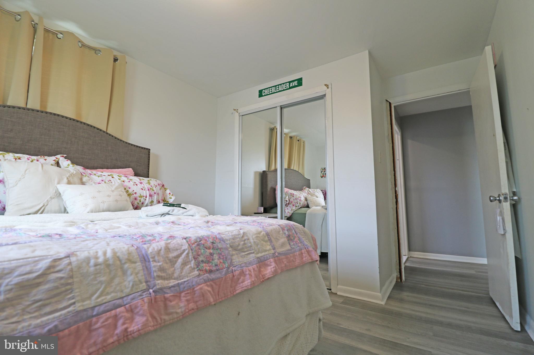212 Riverview Avenue Ridley Park, PA 19078 - Photo 22 of 45 a bedroom with a bed and a mirror