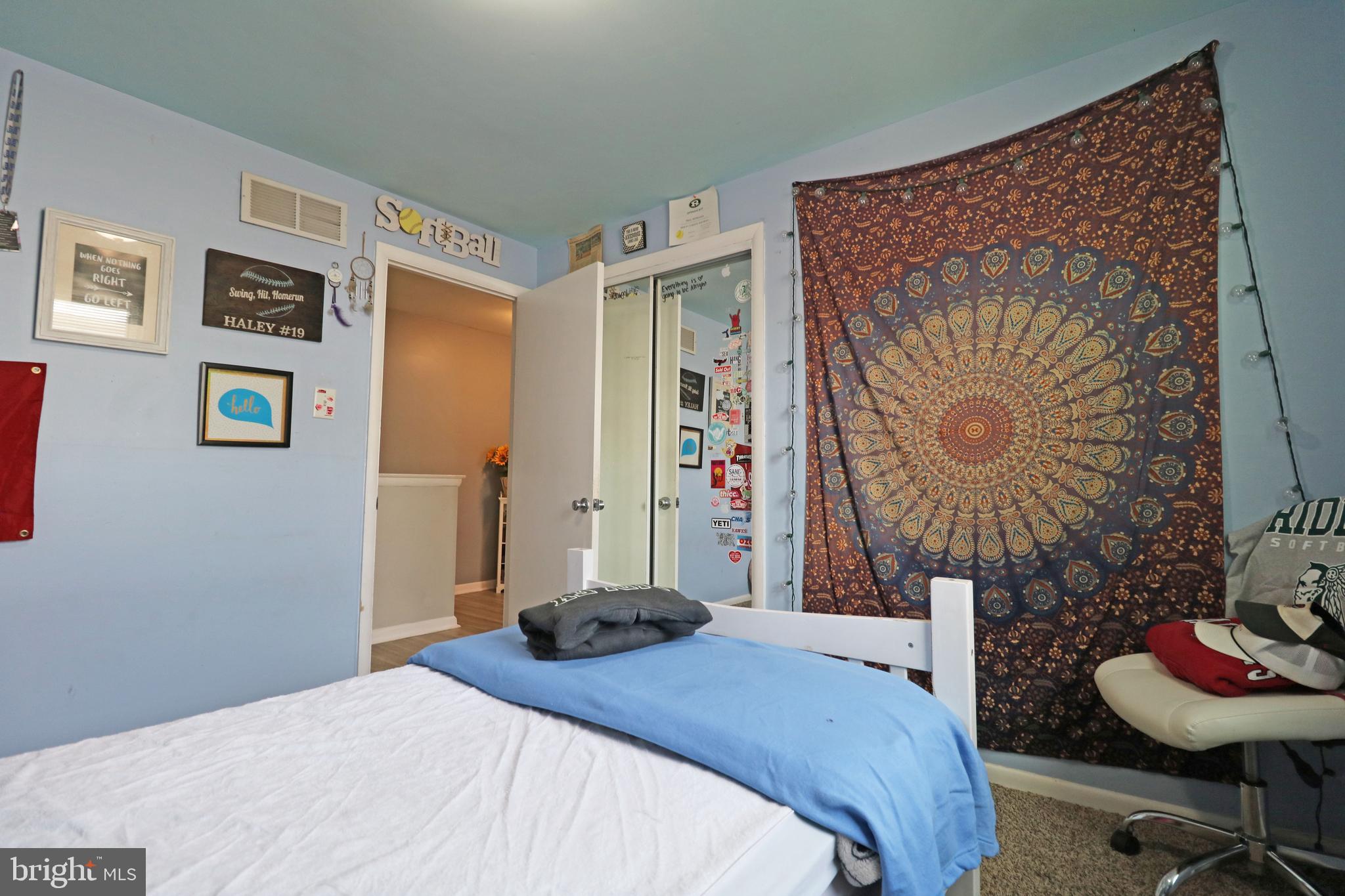 212 Riverview Avenue Ridley Park, PA 19078 - Photo 24 of 45 a bedroom with a bed and a chair