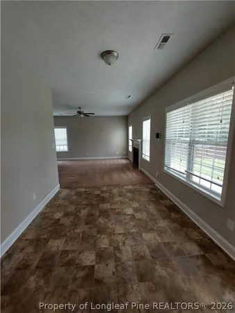 a view of an empty room and window