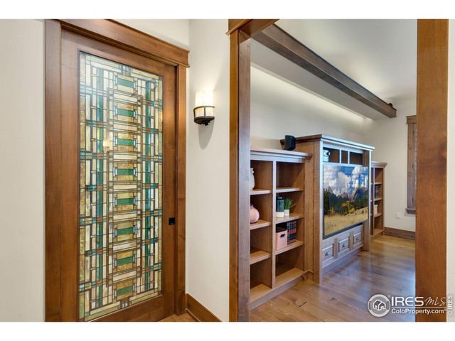 a view of living room with wooden floor and closet