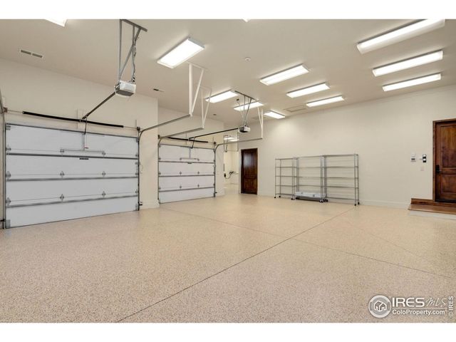 a view of a livingroom with furniture and a ceiling fan