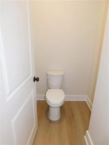 a bathroom with a toilet and a sink