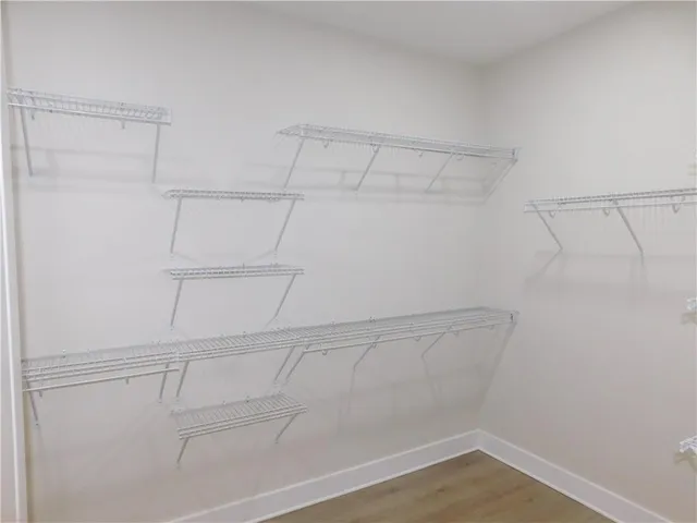 a view of a room with racks on the wall
