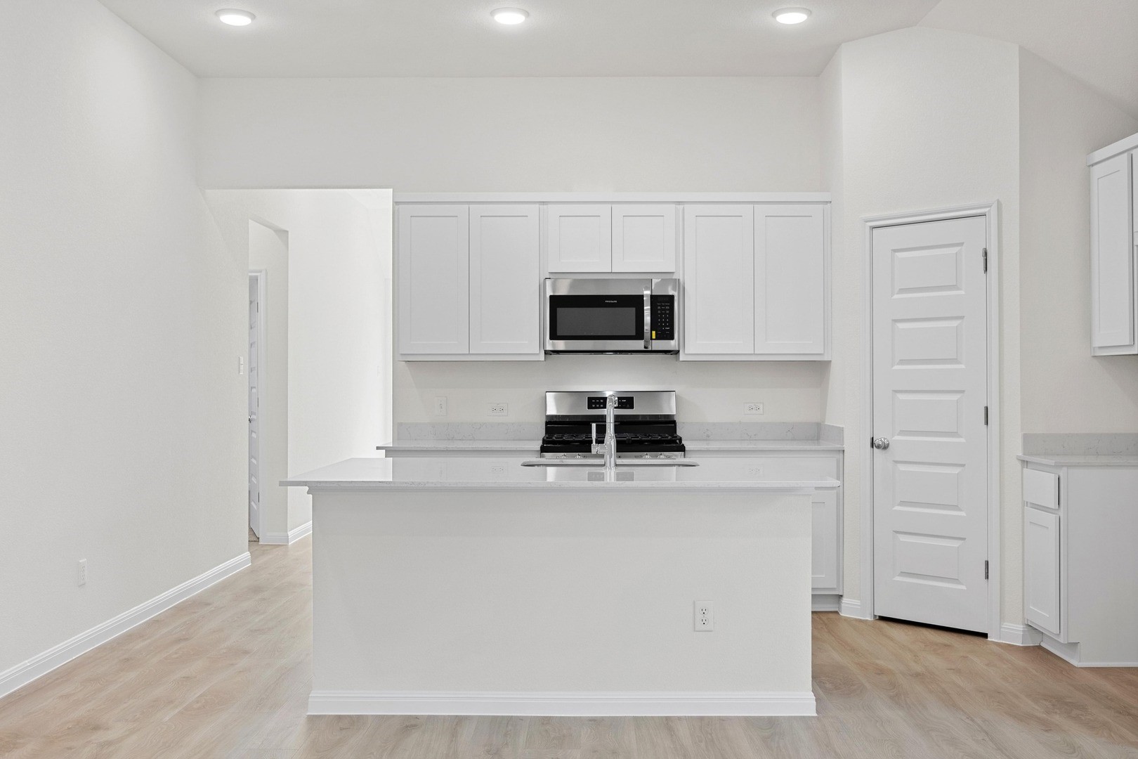 31018 Rena Coast Drive Huffman, TX 77336 - Photo 6 of 25 Kitchen in the Cypress home plan by Trophy Signature Homes - REPRESENTATIVE PHOTO
