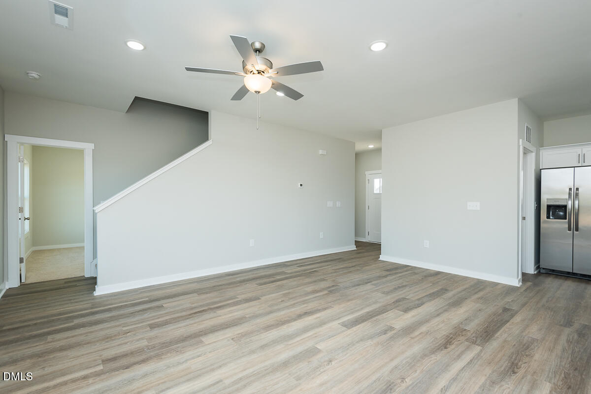 1193 Scarlet Oak Rd Spring Spring Hope, NC 27882 - Photo 11 of 25 a view of an empty room with wooden floor