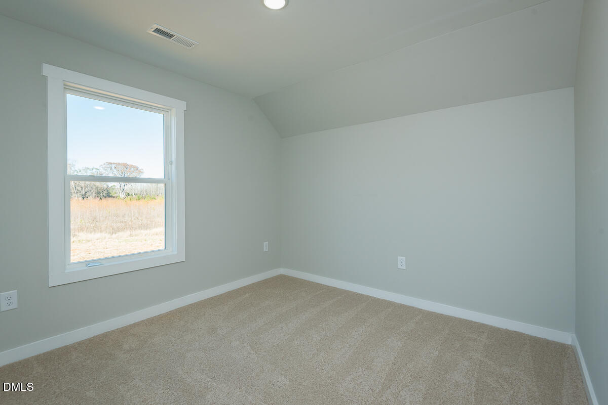 1193 Scarlet Oak Rd Spring Spring Hope, NC 27882 - Photo 22 of 25 an empty room with a window