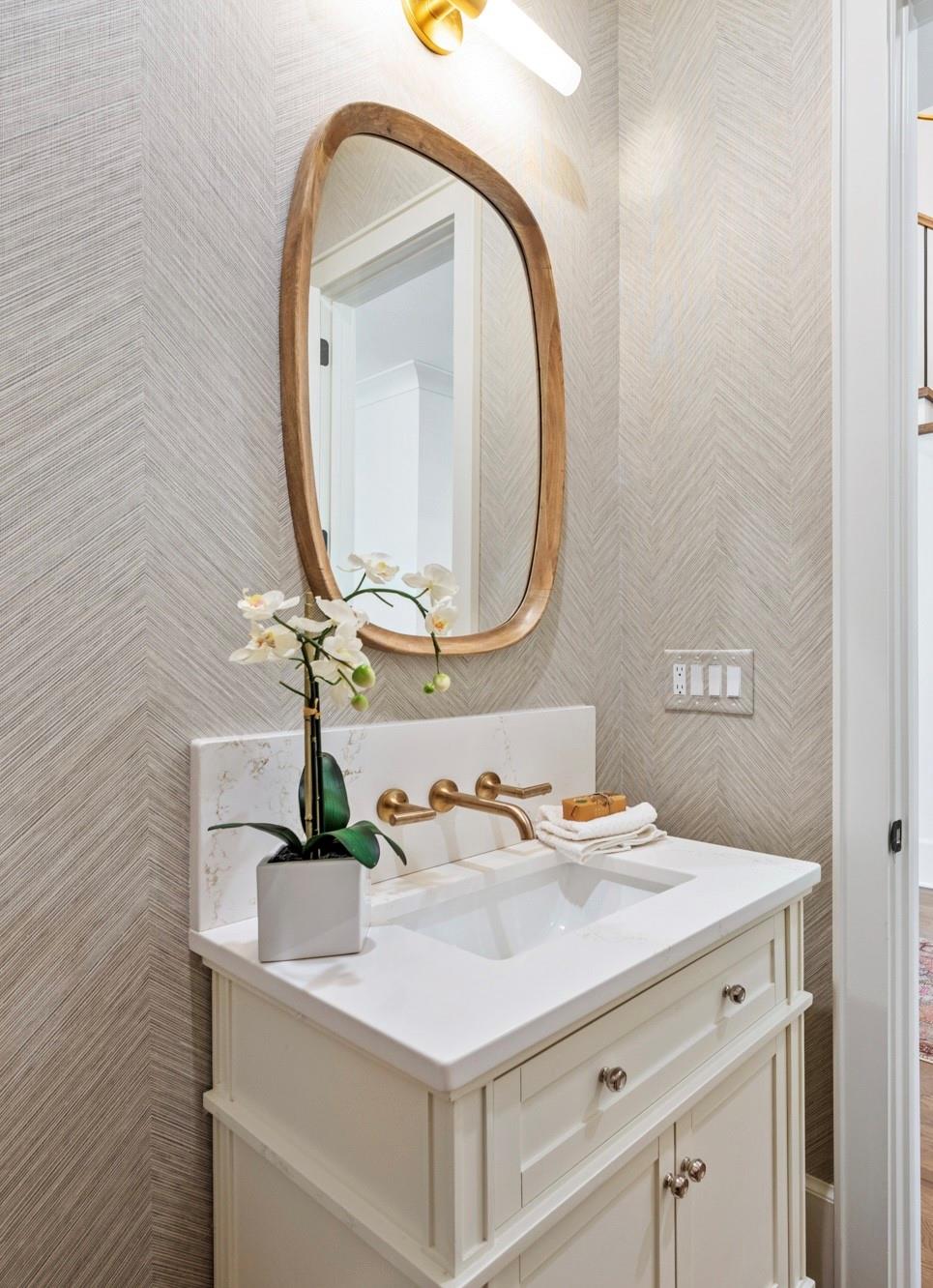 4324 Walker Road Charlotte, NC 28211 - Photo 16 of 44 a bathroom with a sink and a mirror