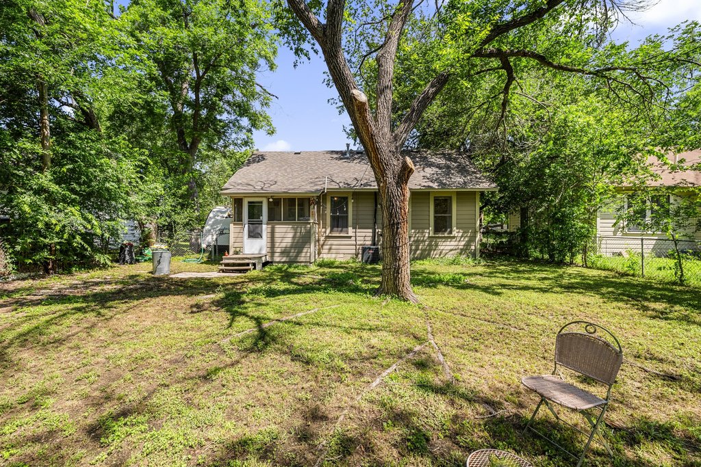 807 Cecelia Street Taylor, TX 76574 - Photo 22 of 24 a view of a house with backyard and sitting area