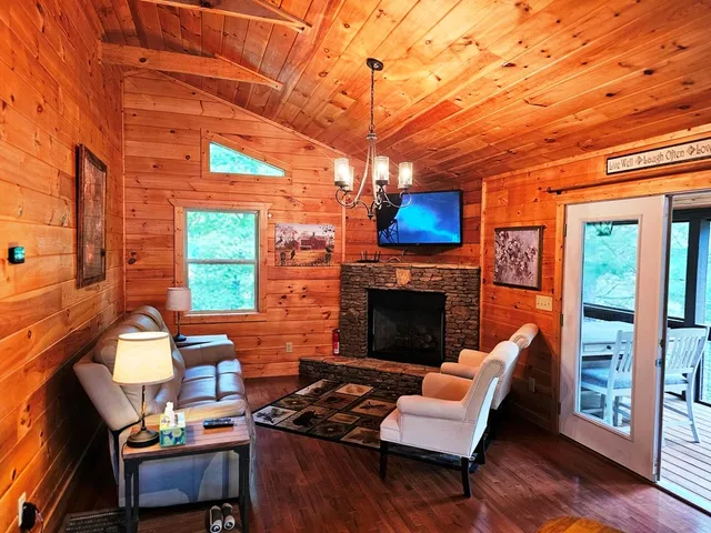 a outdoor space with patio furniture and a fireplace