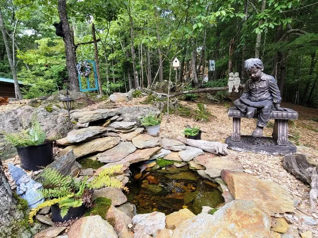 a backyard of a house with lots of green space