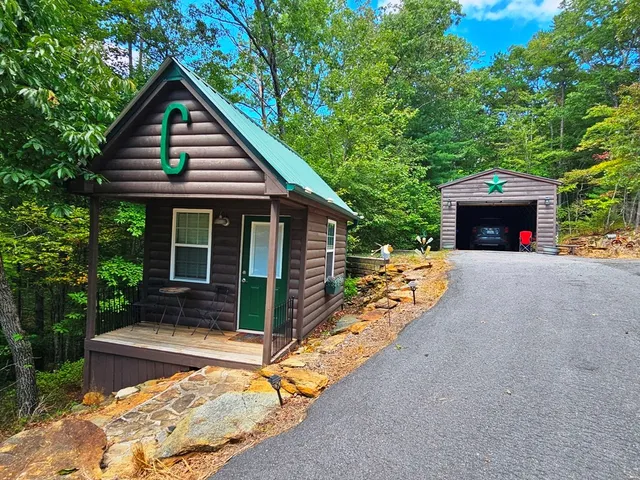 a front view of a house with yard