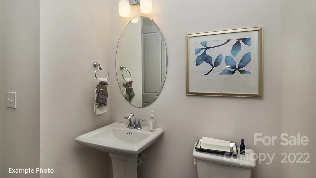 4039 Charlton Road, Unit 276 Fort Mill, SC 29715 - Photo 17 of 29 a bathroom with a sink and mirror